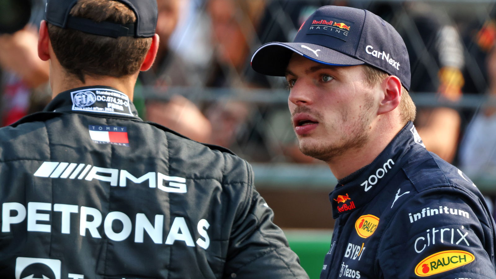 (L to R): George Russell (GBR) Mercedes AMG F1 with pole sitter Max Verstappen (NLD) Red Bull Racing in qualifying parc