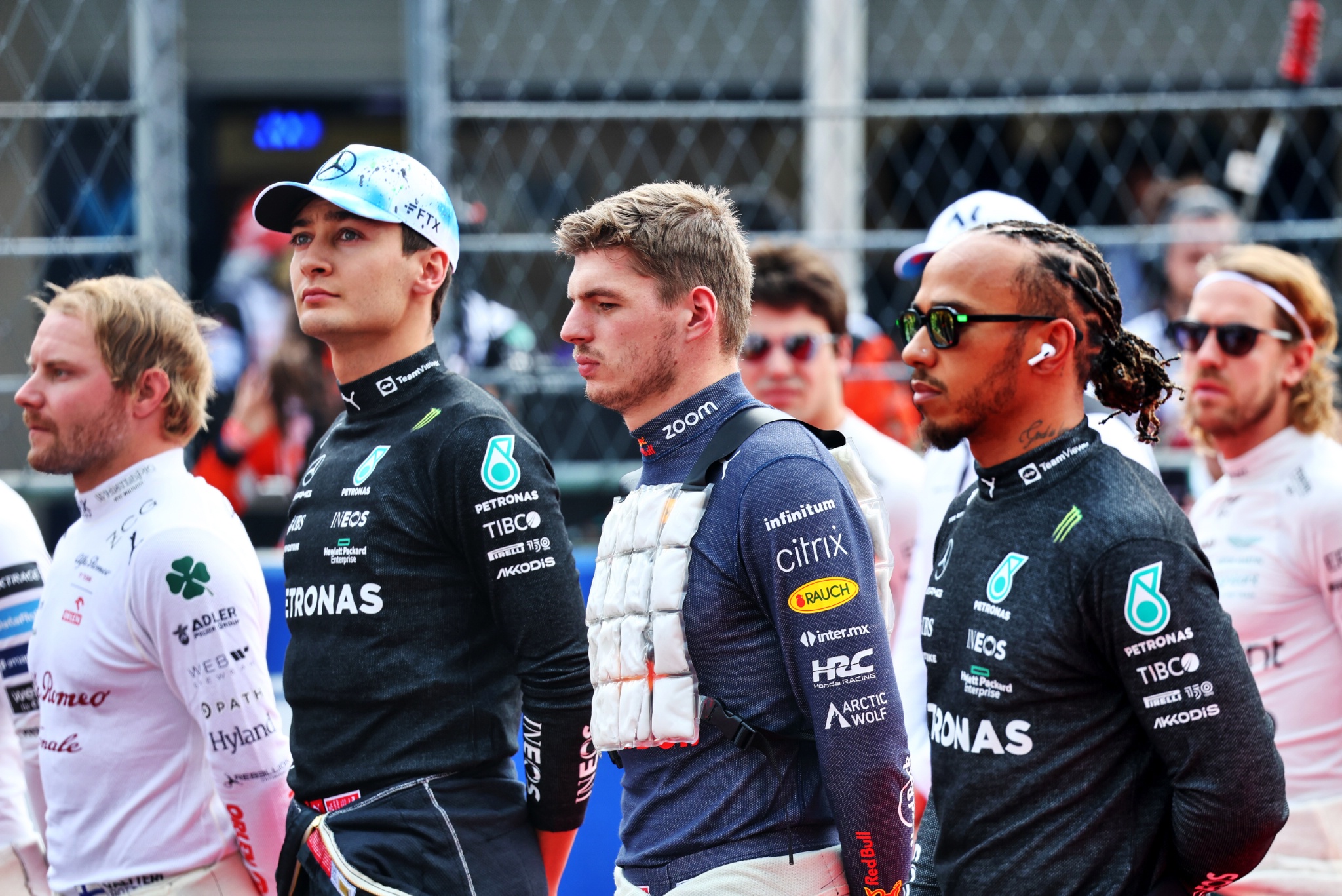 (L to R): George Russell (GBR) Mercedes AMG F1; Max Verstappen (NLD) Red Bull Racing; and Lewis Hamilton (GBR) Mercedes AMG