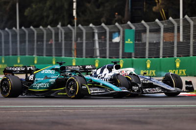 Lance Stroll (CDN) Aston Martin F1 Team AMR22 and Pierre Gasly (FRA) AlphaTauri AT03 battle for position. Formula 1 World