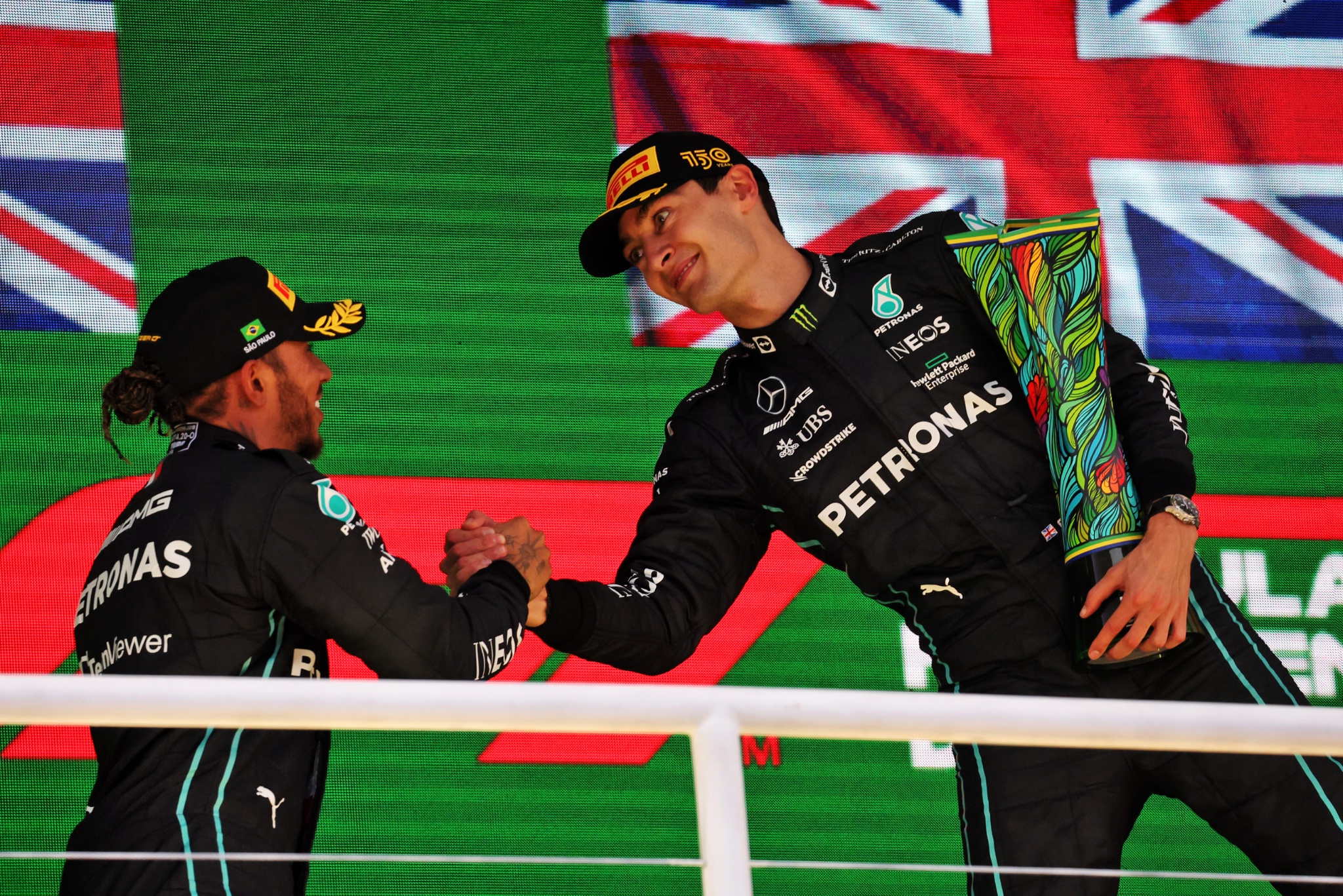 (L to R): Second placed Lewis Hamilton (GBR) Mercedes AMG F1 congratulates race winner and team mate George Russell (GBR)