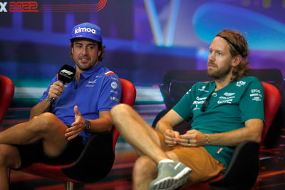 (L to R): Fernando Alonso (ESP) Alpine F1 Team with Sebastian Vettel (GER) Aston Martin F1 Team in the FIA Press