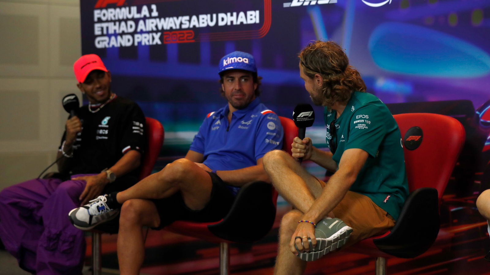 Sebastian Vettel (GER) Aston Martin F1 Team with Fernando Alonso (ESP) Alpine F1 Team and Lewis Hamilton (GBR) Mercedes AMG