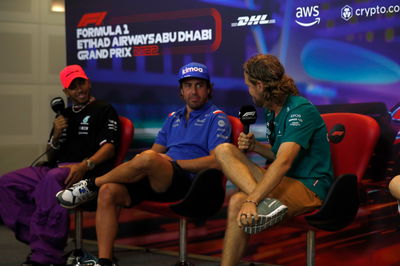 Sebastian Vettel (GER) Aston Martin F1 Team with Fernando Alonso (ESP) Alpine F1 Team and Lewis Hamilton (GBR) Mercedes AMG