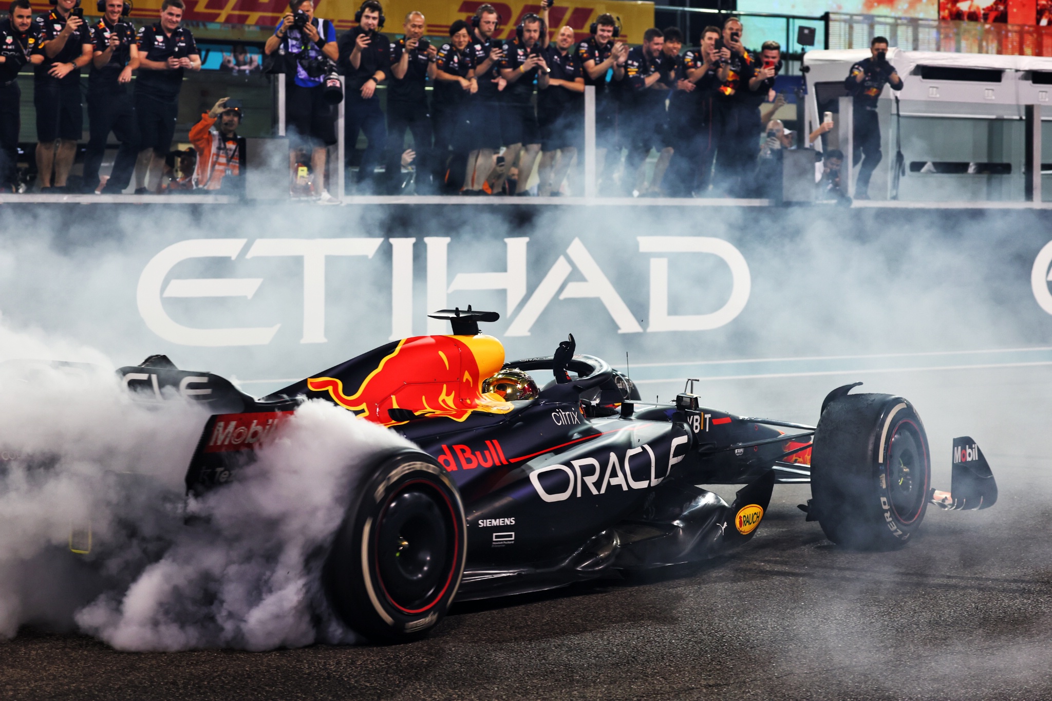 Race winner Max Verstappen (NLD) Red Bull Racing RB18 performs donuts at the end of the race. Formula 1 World