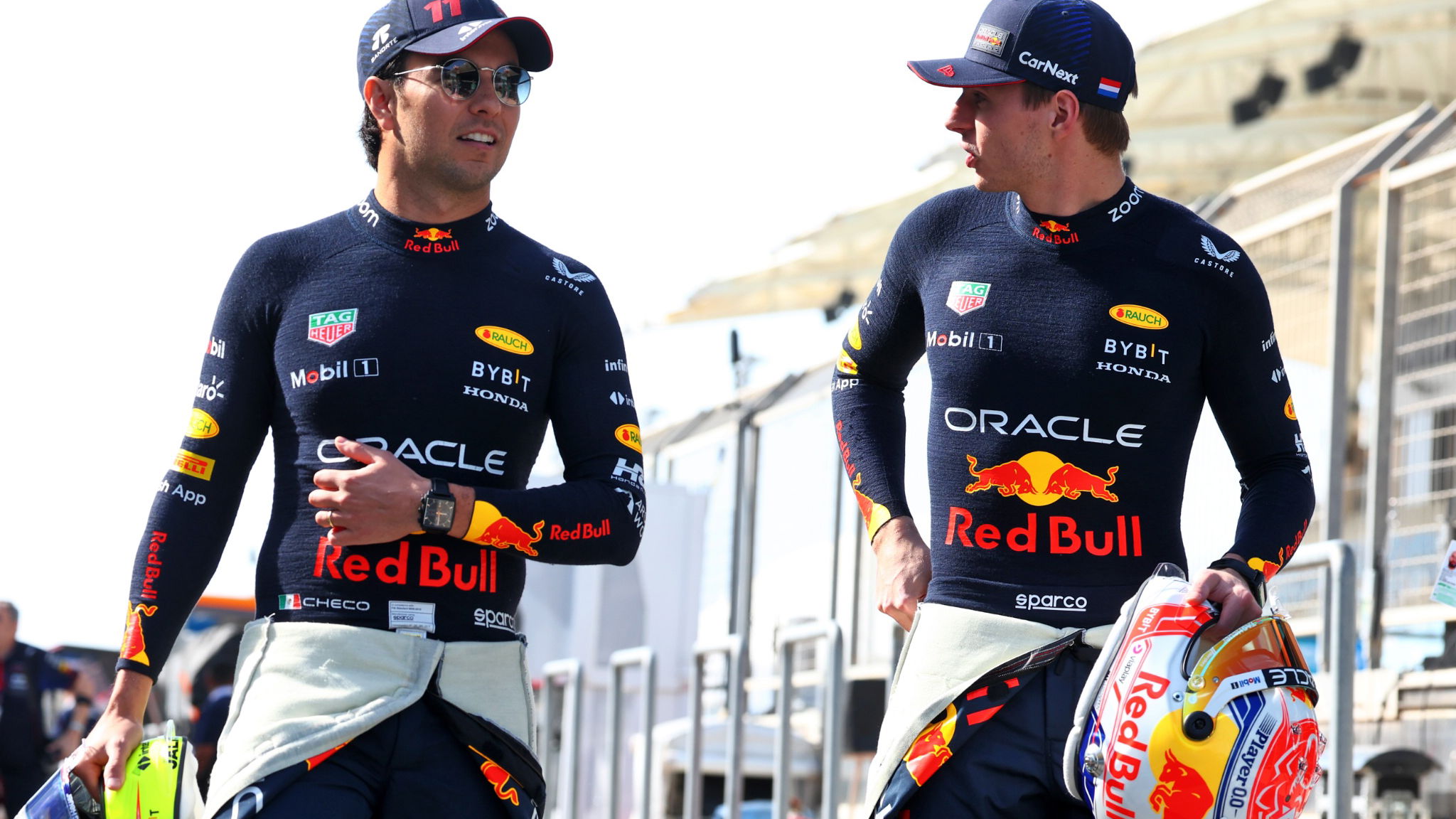 (L to R): Sergio Perez (MEX) Red