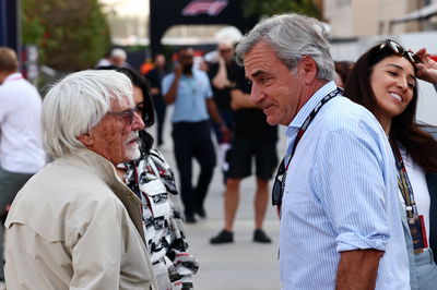 (L to R): Bernie Ecclestone (GBR) with Carlos Sainz (ESP). Formula 1 World Championship, Rd 1, Bahrain Grand Prix, Sakhir,