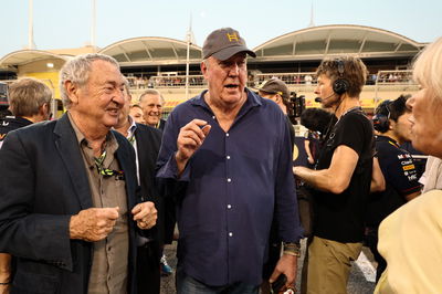 Jeremy Clarkson (GBR) TV Presenter with Nick Mason (GBR) Pink Floyd Drummer on the grid. Formula 1 World Championship, Rd