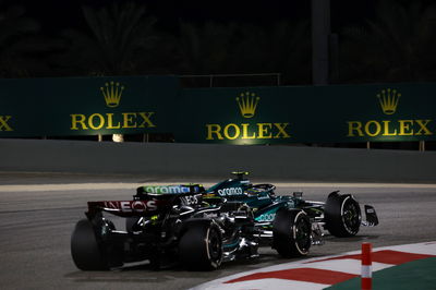 Fernando Alonso (ESP) Aston Martin F1 Team AMR23 leads Lewis Hamilton (GBR) Mercedes AMG F1 W14. Formula 1 World