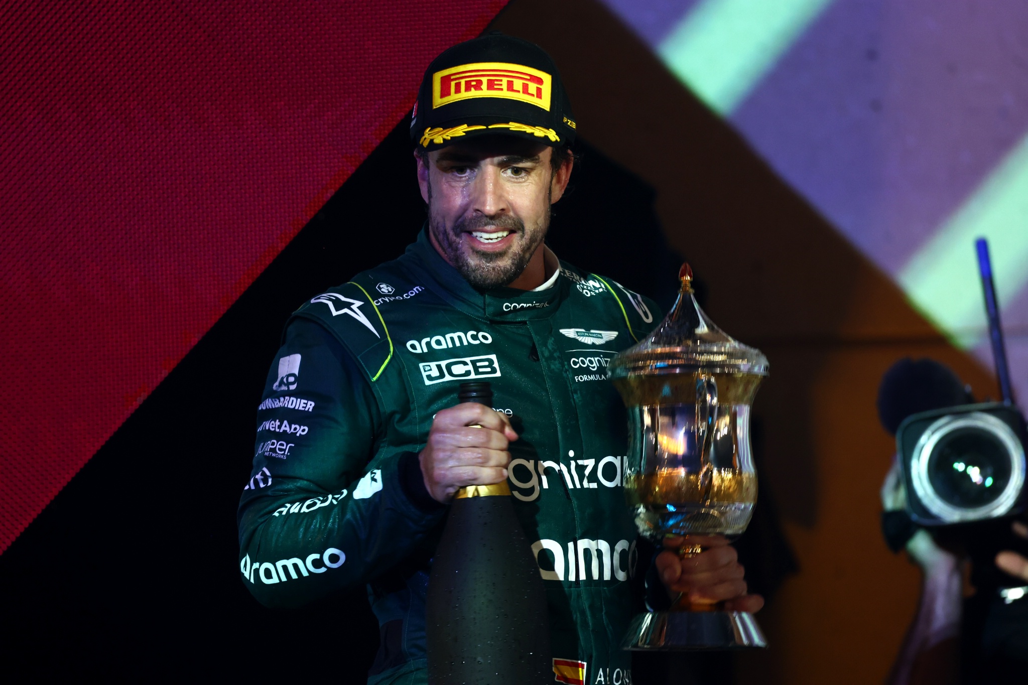 Fernando Alonso (ESP) Aston Martin F1 Team celebrates his third position on the podium. Formula 1 World Championship, Rd