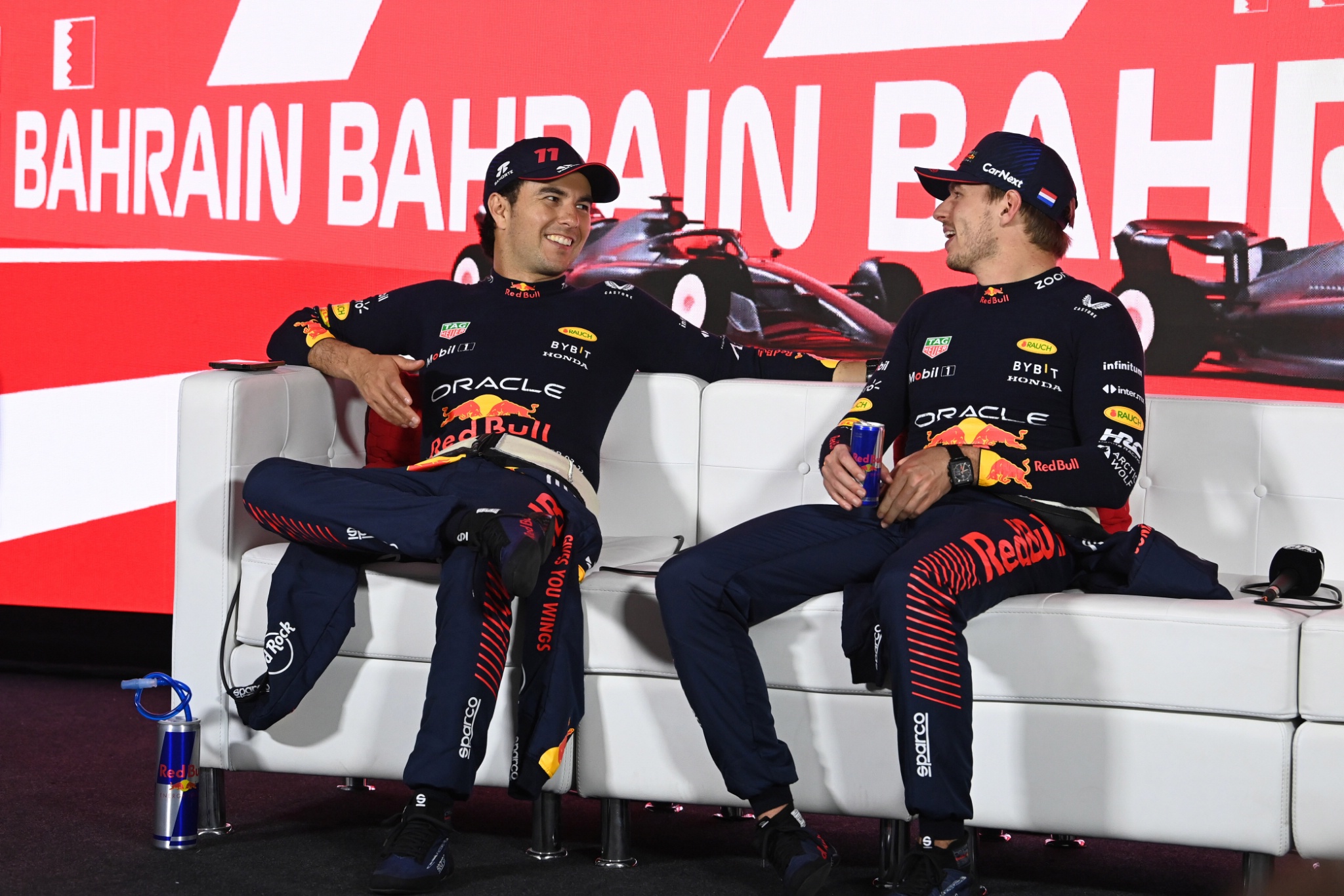 (L to R): Sergio Perez (MEX) Red Bull Racing and team mate Max Verstappen (NLD) Red Bull Racing in the post race FIA Press