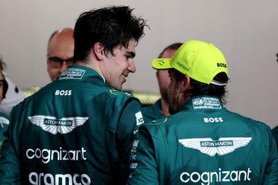 (L to R): Lance Stroll (CDN) Aston Martin F1 Team with team mate Fernando Alonso (ESP) Aston Martin F1 Team in qualifying