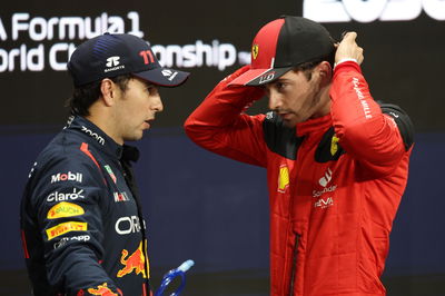 (L to R): Sergio Perez (MEX) Red Bull Racing with Charles Leclerc (MON) Ferrari in qualifying parc ferme. Formula 1 World