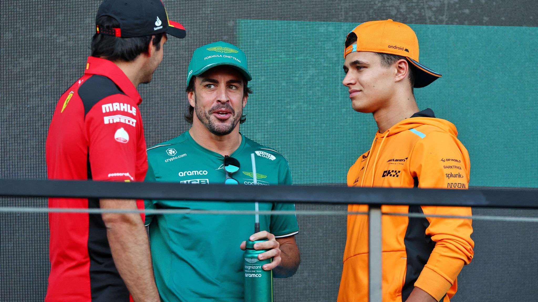 (L to R): Carlos Sainz Jr (ESP) Ferrari with Fernando Alonso (ESP) Aston Martin F1 Team and Lando Norris (GBR) McLaren on