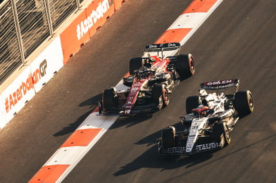 Valtteri Bottas (FIN) Alfa Romeo F1 Team C43 and Nyck de Vries (NLD) AlphaTauri AT04 battle for position. Formula 1 World