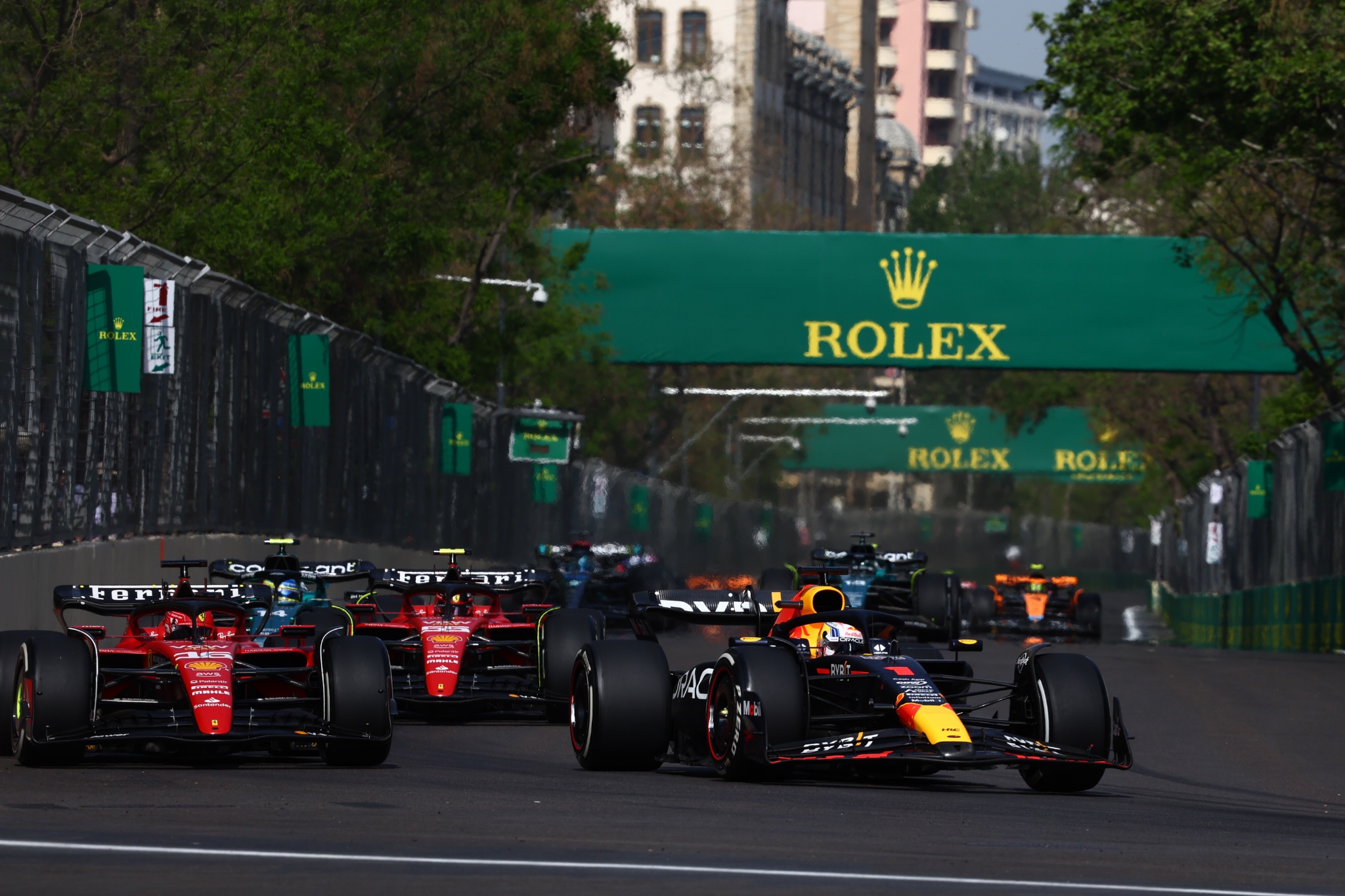 (L to R): Charles Leclerc (MON) Ferrari SF-23 and Max Verstappen (NLD) Red Bull Racing RB19 battle for position. Formula 1