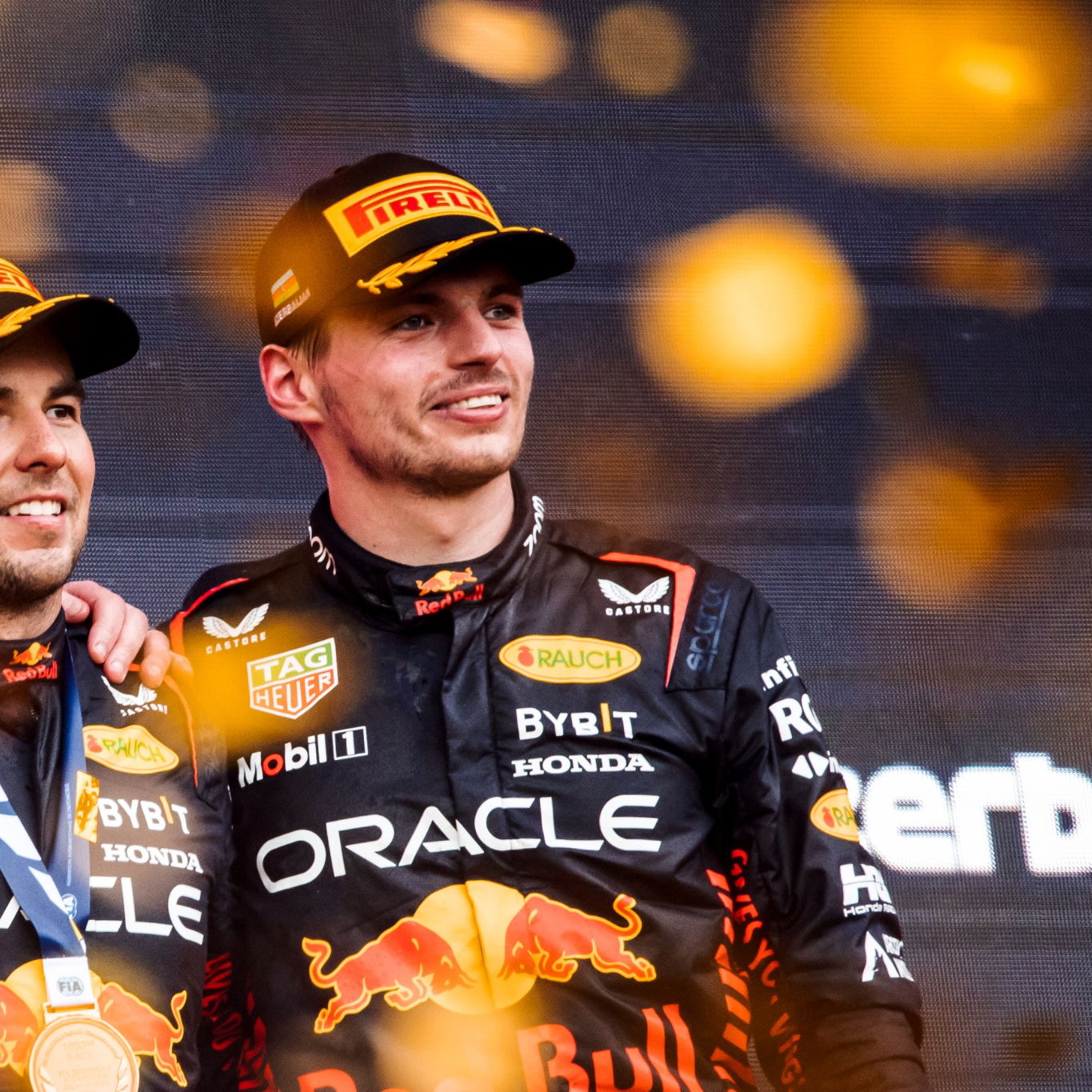 (L to R): Race winner Sergio Perez (MEX) Red Bull Racing with second placed team mate Max Verstappen (NLD) Red Bull Racing