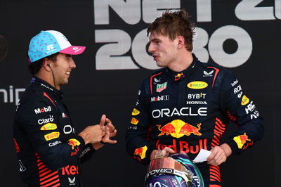 2nd place Sergio Perez (MEX) Red Bull Racing with 1st place Max Verstappen (NLD) Red Bull Racing. Formula 1 World