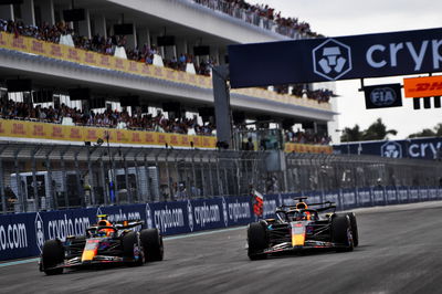 (L to R): Sergio Perez (MEX) Red Bull Racing RB19 and Max Verstappen (NLD) Red Bull Racing RB19 battle for the lead of the