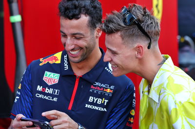 (L to R): Daniel Ricciardo (AUS) Red Bull Racing Reserve and Third Driver with Fabio Quartararo (FRA) MotoGP Motorcycle