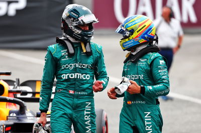 (L to R): Lance Stroll (CDN) Aston Martin F1 Team and Fernando Alonso (ESP) Aston Martin F1 Team in qualifying parc ferme.