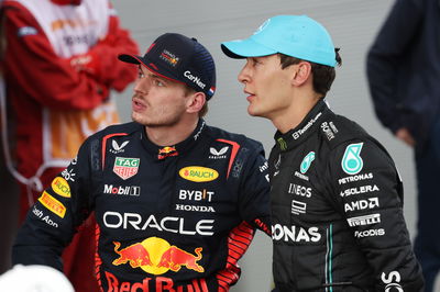 (L to R): Max Verstappen (NLD) Red Bull Racing with George Russell (GBR) Mercedes AMG F1 in parc ferme. Formula 1 World