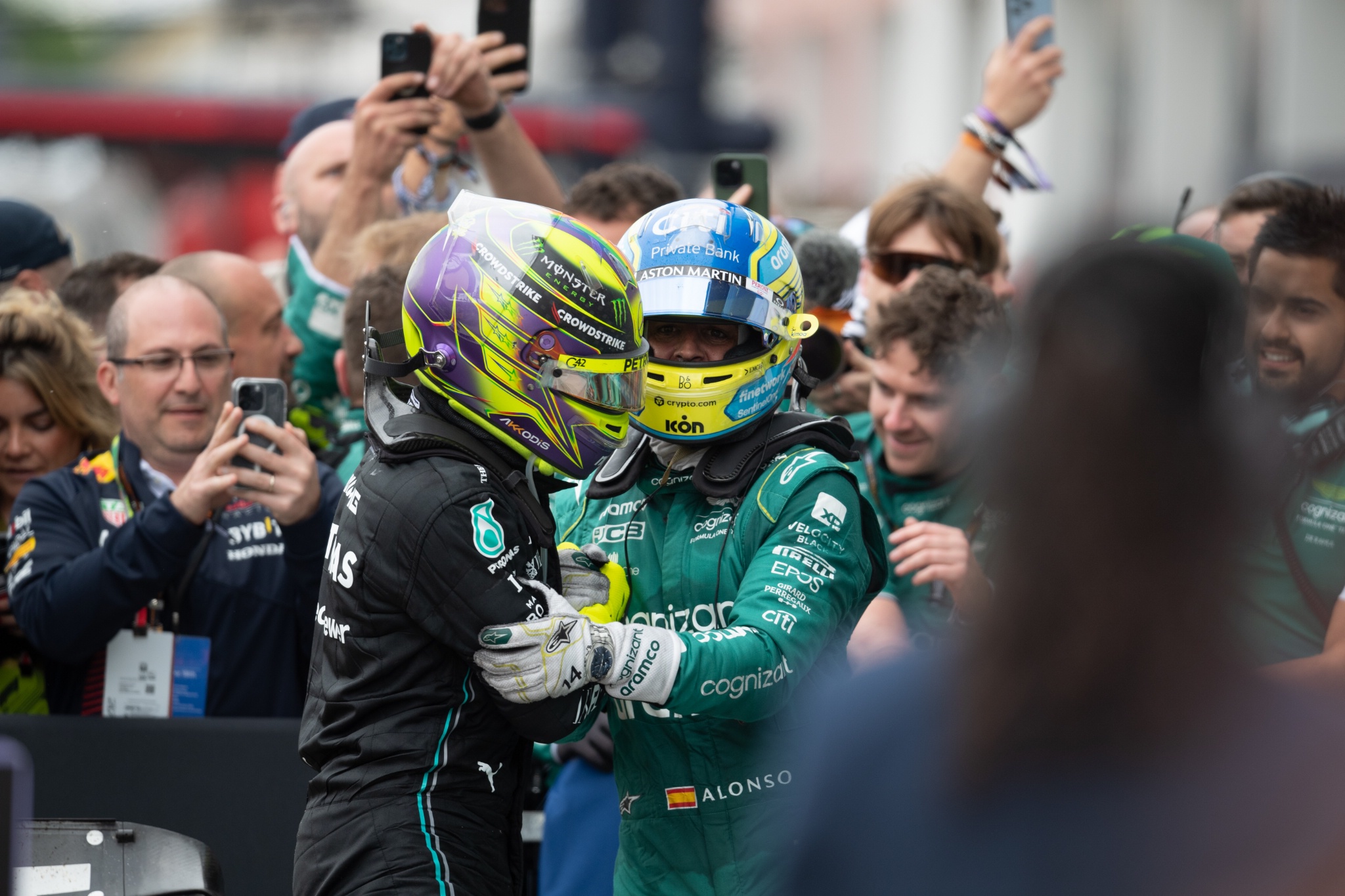 (L to R): Lewis Hamilton (GBR) Mercedes AMG F1 celebrates his third position in parc ferme with second placed Fernando