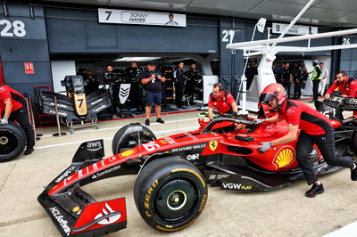 Ferrari SF-23 pushed past the fictional APXGP pit garages, in place for the forthcoming Apple movie. Formula 1 World