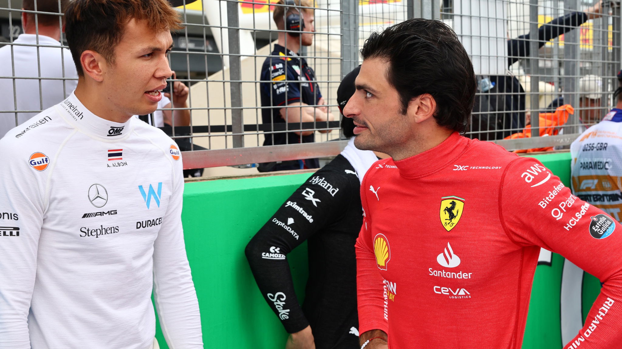 (L to R): Alexander Albon (THA) Williams Racing with Carlos Sainz Jr (ESP) Ferrari on the grid. Formula 1 World