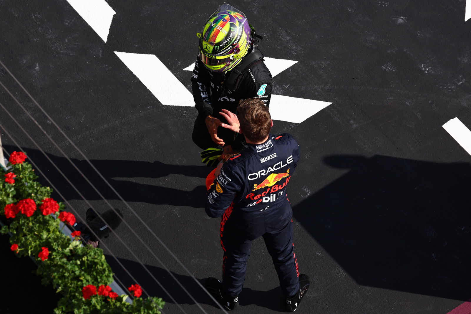 Pole sitter Lewis Hamilton (GBR) Mercedes AMG F1 with second placed Max Verstappen (NLD) Red Bull Racing in qualifying parc