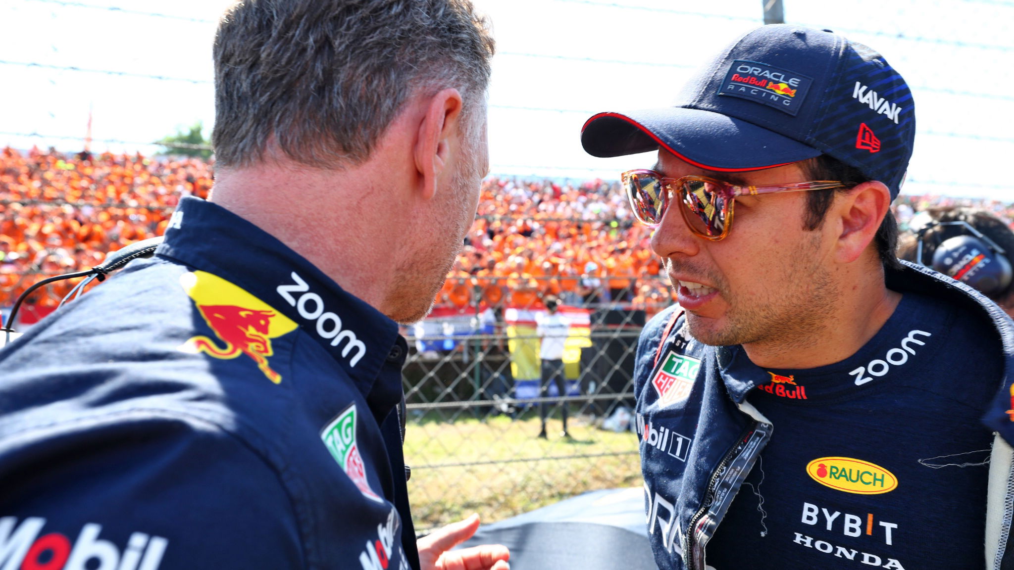 Sergio Perez (MEX) Red Bull Racing (Right) with Christian Horner (GBR) Red Bull Racing Team Principal on the grid. Formula