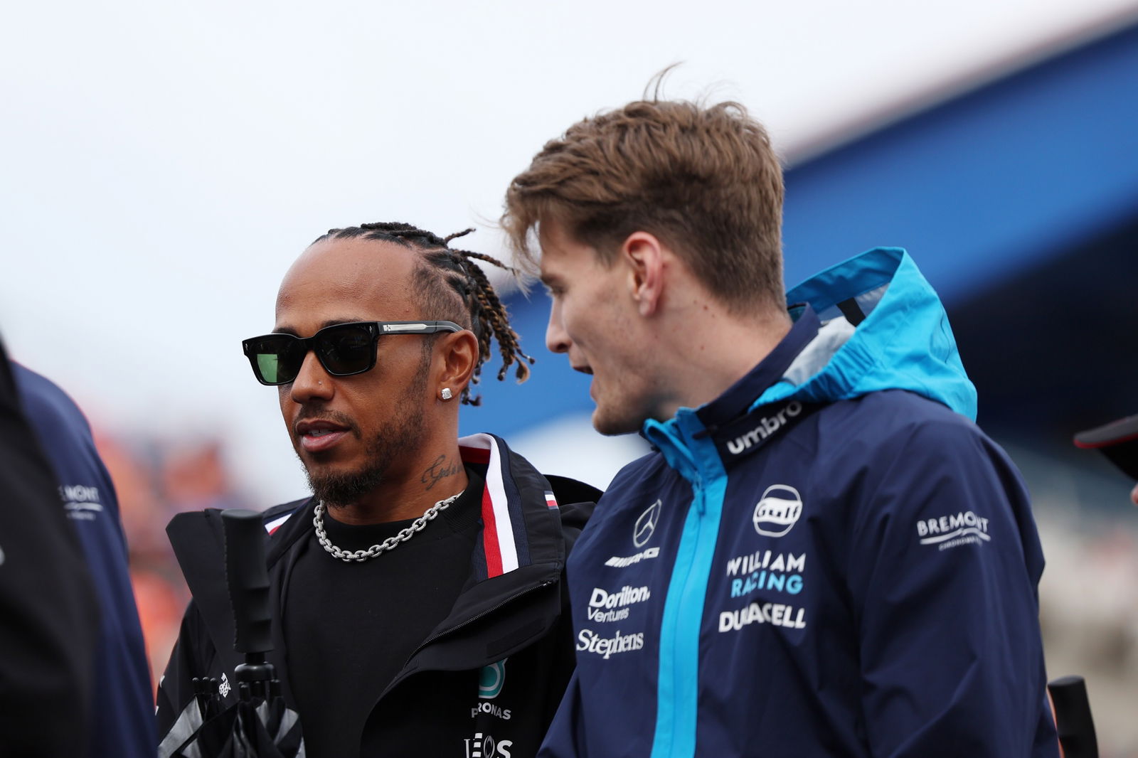 (L to R): Lewis Hamilton (GBR) Mercedes AMG F1 with Logan Sargeant (USA) Williams Racing on the drivers' parade. Formula 1