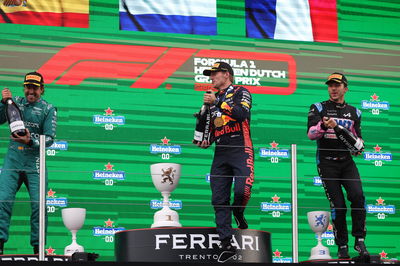 The podium (L to R): Fernando Alonso (ESP) Aston Martin F1 Team, second; Max Verstappen (NLD) Red Bull Racing, race winner;