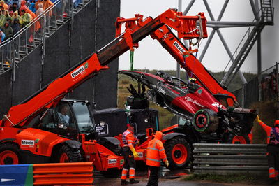 The Alfa Romeo F1 Team C43 of Zhou Guanyu (CHN) Alfa Romeo F1 Team is removed from the track after he crashed out of the