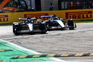 George Russell (GBR) Mercedes AMG F1 W14 leaves the pits ahead of Esteban Ocon (FRA) Alpine F1 Team A523 and runs wide.
