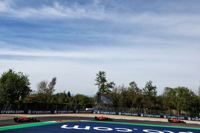 Carlos Sainz Jr (ESP) Ferrari SF-23 leads Charles Leclerc (MON) Ferrari SF-23 and Sergio Perez (MEX) Red Bull Racing RB19.