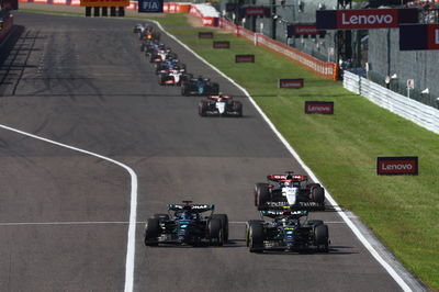 George Russell (GBR) Mercedes AMG F1 W14 and team mate Lewis Hamilton (GBR) Mercedes AMG F1 W14 battle for position.