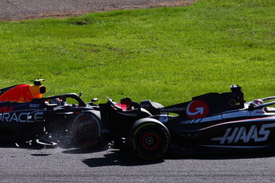 Kevin Magnussen (DEN) Haas VF-23 is hit by Sergio Perez (MEX) Red Bull Racing RB19. Formula 1 World Championship, Rd 17,