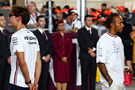 (L to R): George Russell (GBR) Mercedes AMG F1 and Lewis Hamilton (GBR) Mercedes AMG F1 on the drivers' parade. Formula 1