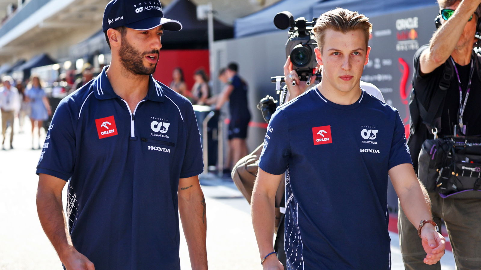 (L to R): Daniel Ricciardo (AUS) AlphaTauri with Liam Lawson (NZL) AlphaTauri Reserve Driver. Formula 1 World