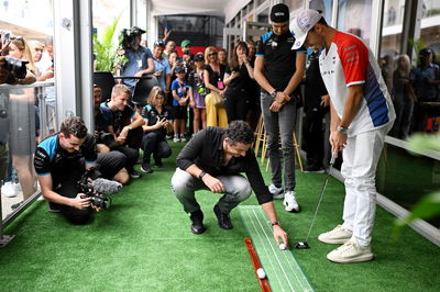 Pierre Gasly (FRA) Alpine F1 Team plays golf with Rory McIlroy (GBR) Professional Golfer and Otro Capital Alpine F1 Team