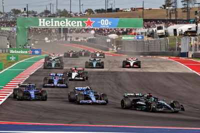 George Russell (GBR) Mercedes AMG F1 W14 leads Pierre Gasly (FRA) Alpine F1 Team A523 and Alexander Albon (THA) Williams