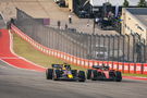 Max Verstappen (NLD) Red Bull Racing RB19 leads Charles Leclerc (MON) Ferrari SF-23 at the start of Sprint. Formula 1