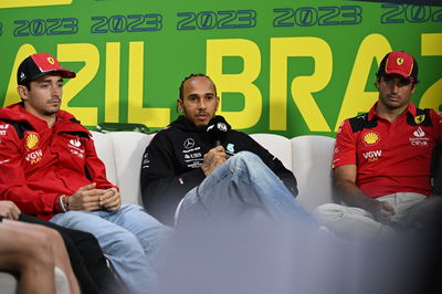 (L to R): Charles Leclerc (MON) Ferrari; Lewis Hamilton (GBR) Mercedes AMG F1; and Carlos Sainz Jr (ESP) Ferrari, in the FIA