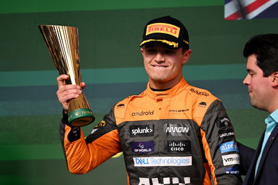 Lando Norris (GBR) McLaren celebrates his second position on the podium. Formula 1 World Championship, Rd 21, Brazilian