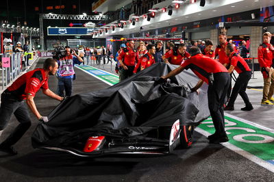 The Ferrari SF-23 of Carlos Sainz Jr (ESP) Ferrari SF-23 is recovered back to the pits after hitting a manhole cover on