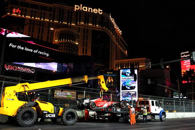 The Ferrari SF-23 of Carlos Sainz Jr (ESP) Ferrari is recovered back to the pits on the back of a truck after hitting a