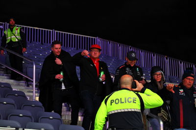 Fans show their displeasure as Police eject them from the grandstands fefore the start of FP2. Formula 1 World