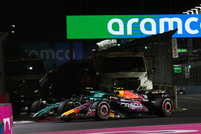 Fernando Alonso (ESP) Aston Martin F1 Team AMR23 and Sergio Perez (MEX) Red Bull Racing RB19 battle for position. Formula