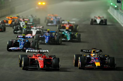 Charles Leclerc (MON) Ferrari SF-23 and Max Verstappen (NLD) Red Bull Racing RB19 at the start of the race. Formula 1