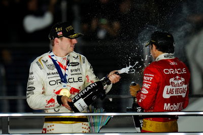 (L to R): Race winner Max Verstappen (NLD) Red Bull Racing celebrates on the podium with third placed team mate Sergio Perez